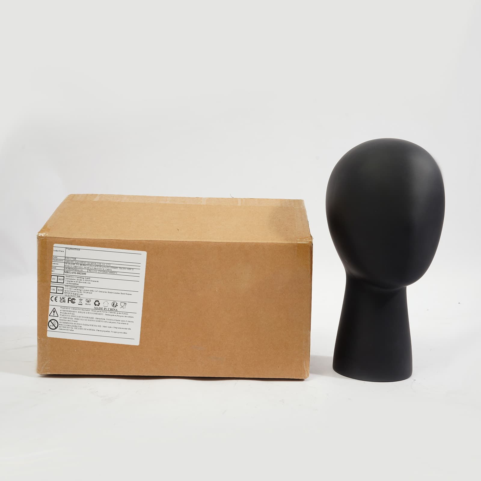 Kurzer Schaufensterkopf, Kopfumfang 56 cm, schwarz. Schaufensterpuppenkopfständer, Schaufensterpuppenkopfständer